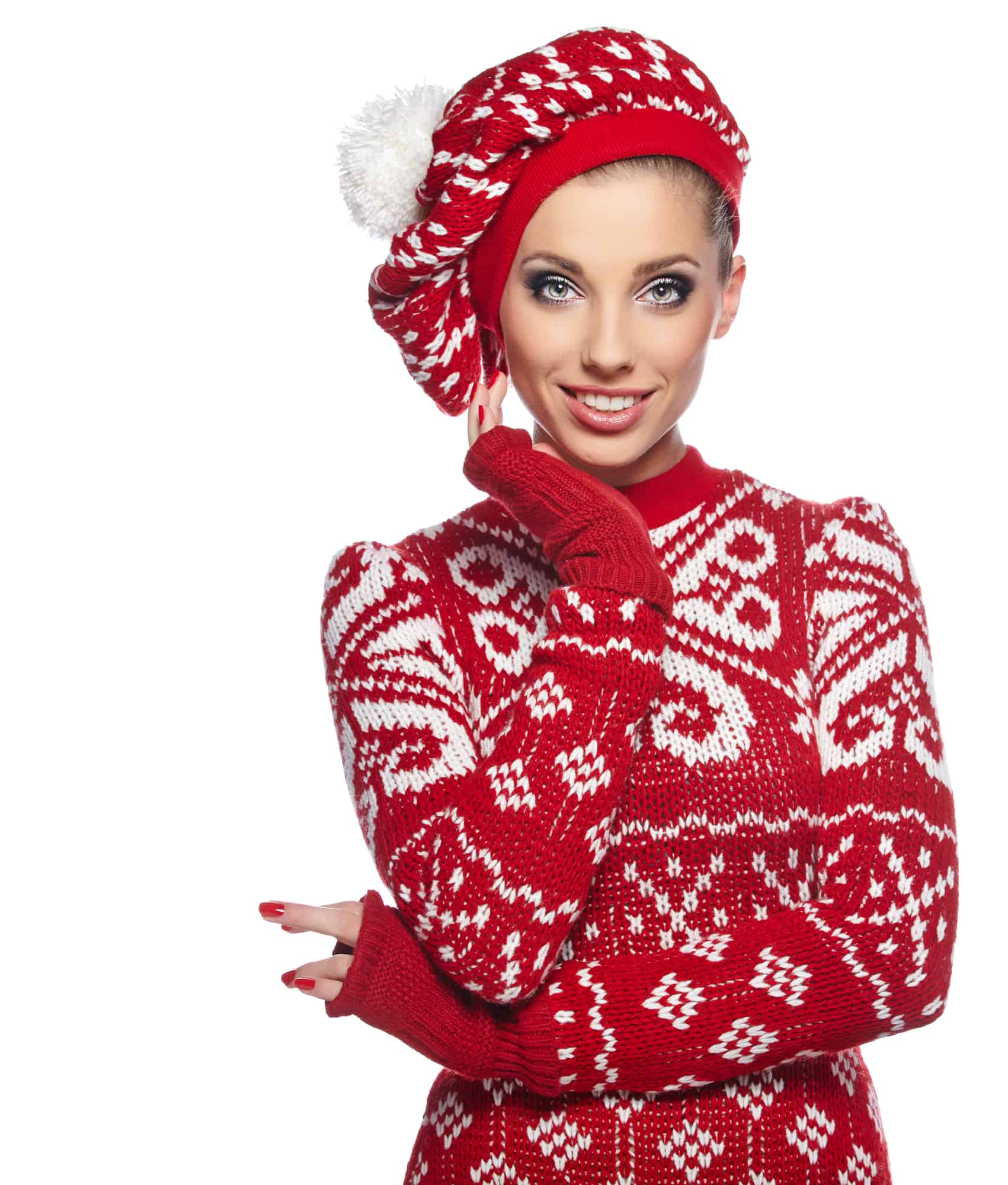 Kvinde i rød julesweater og rød hue